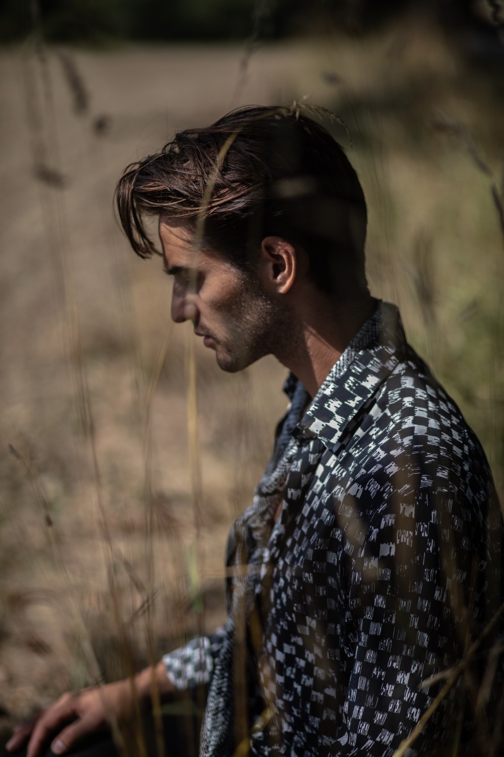 male model romantic fashion editorial field tree saint laurent silk shirt field