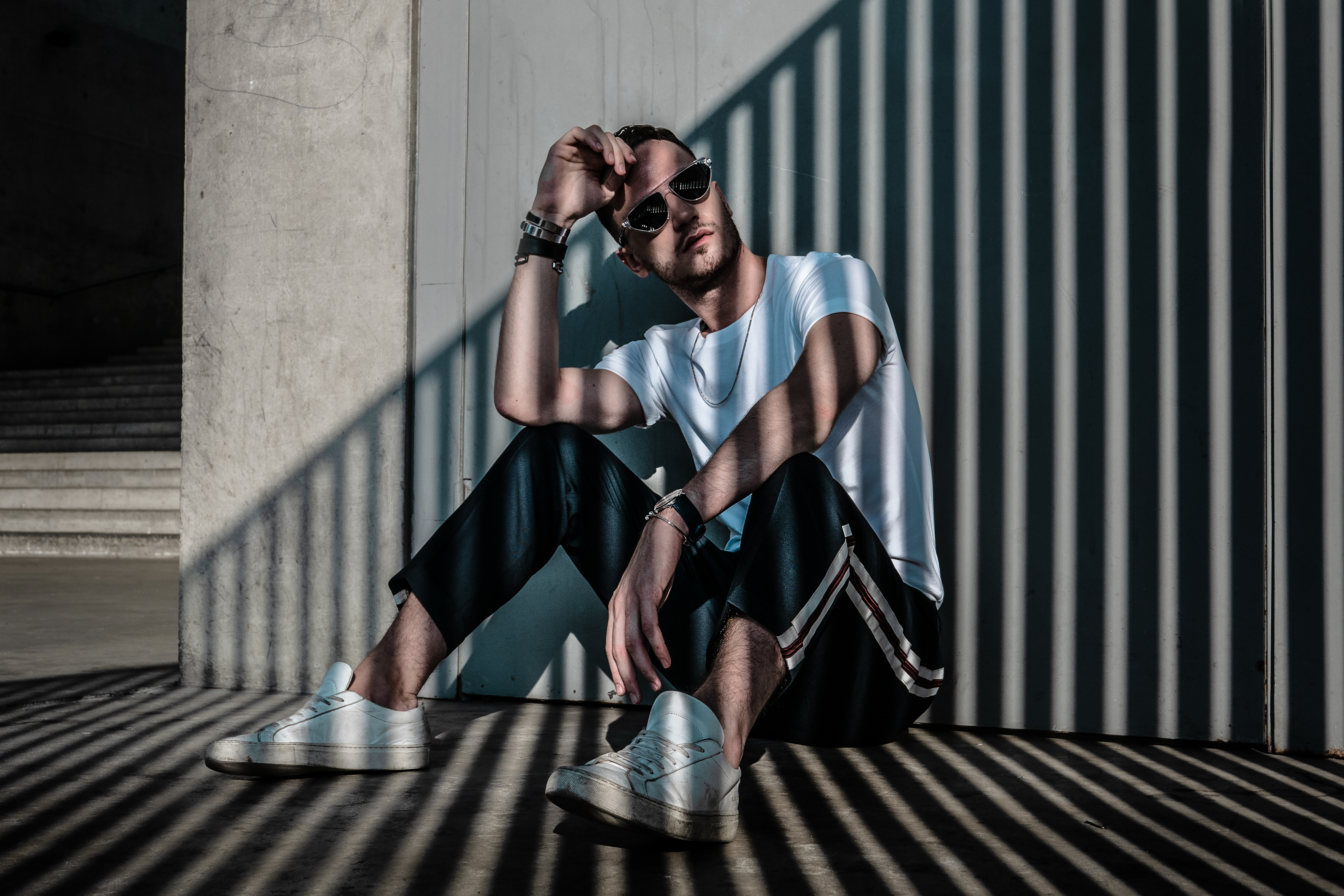 fashion photography shadow stairs men's fashion streetwear modern urban